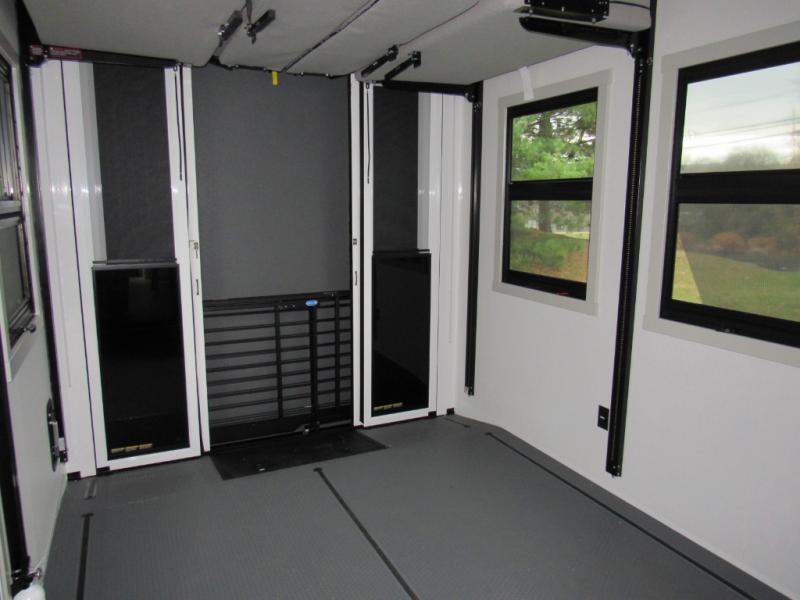 Brinkley Model G 3500 garage space with patio doors, windows, and a power bunk